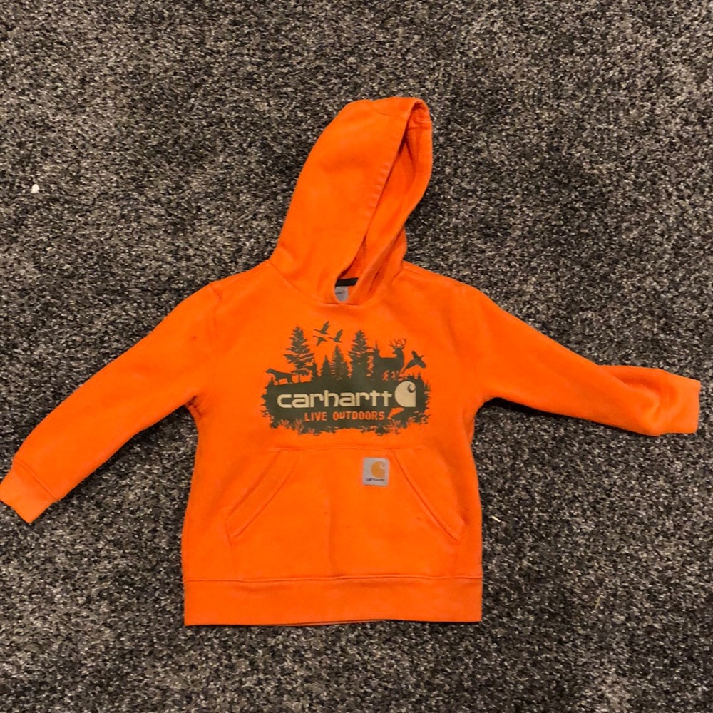 Well loved orange Carhartt hoodie